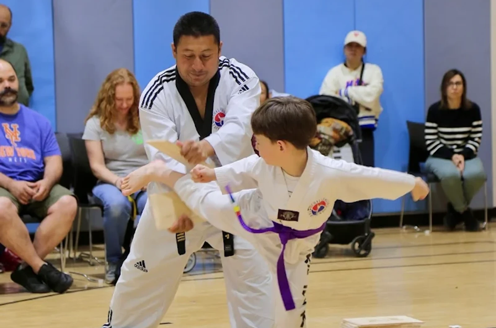 Kids learning sportsmanship through martial arts