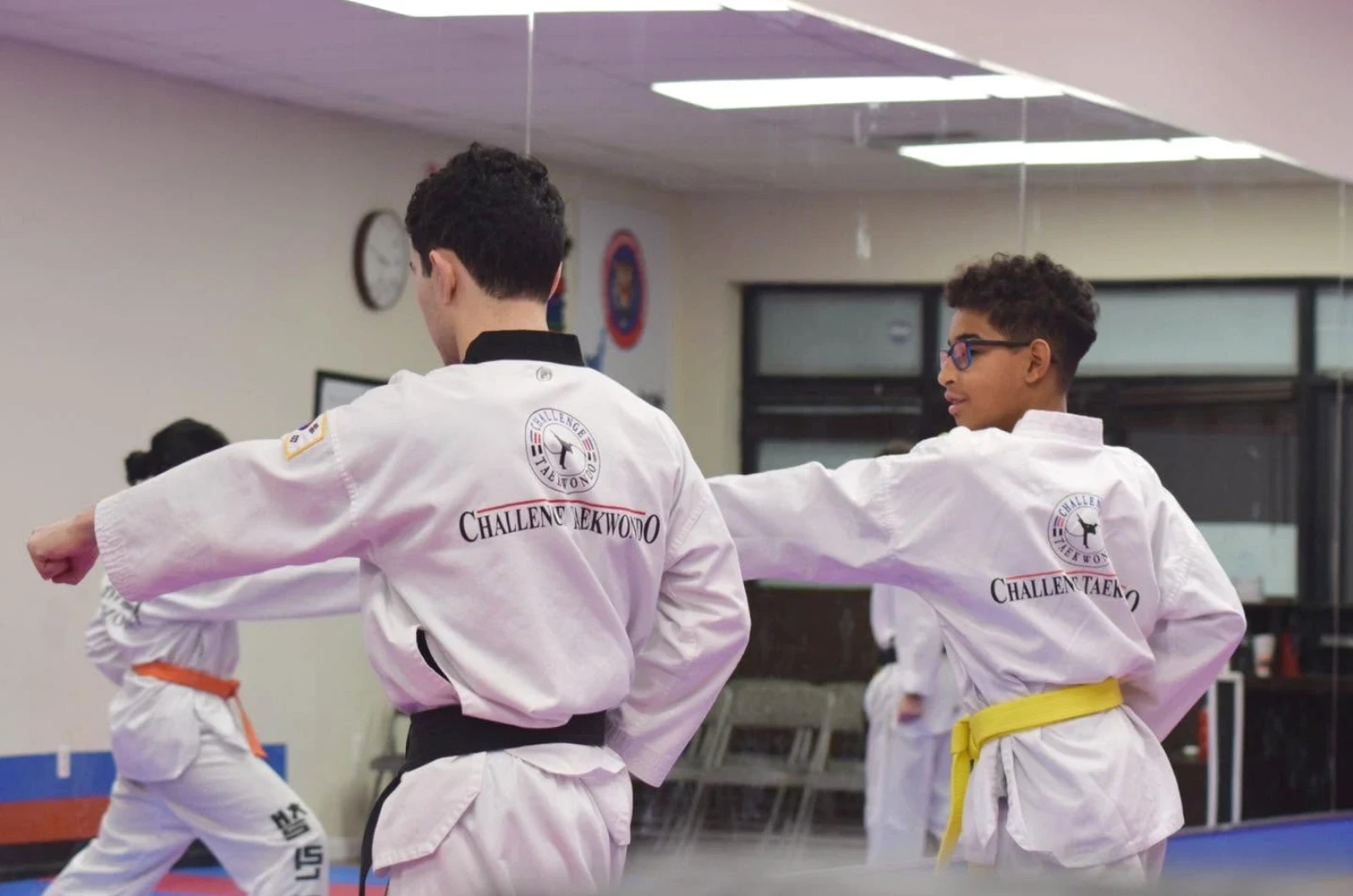 Teens developing decision-making skills in martial arts